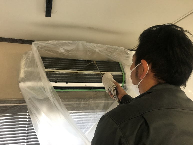 高圧洗浄機使用中